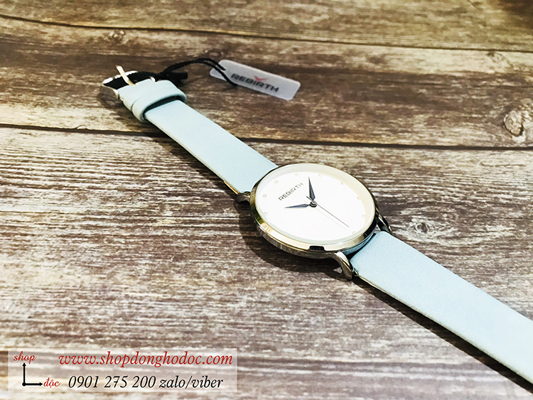 Đồng hồ nữ dây da mặt tròn xanh dương pastel Rebirth ĐHĐ21501