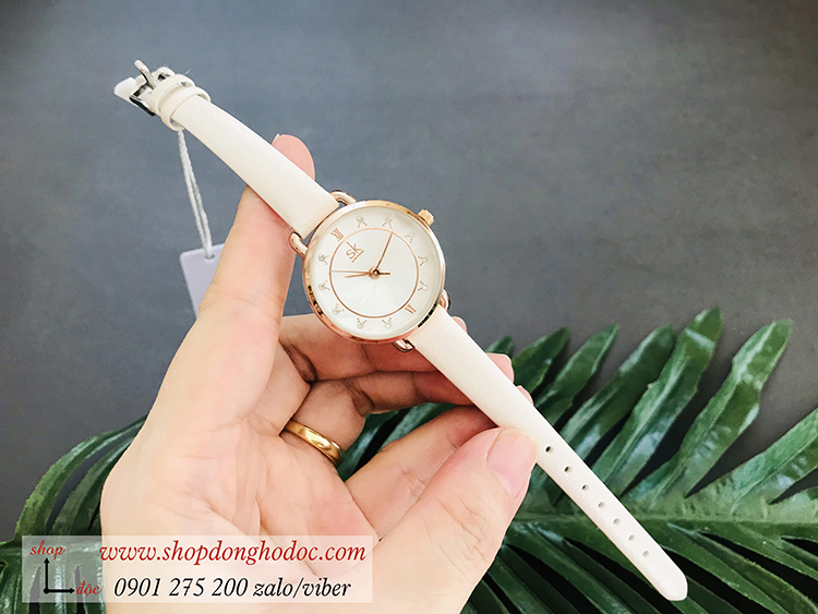 Đồng hồ Sk nữ dây da mặt tròn trắng sang chảnh ĐHĐ19303